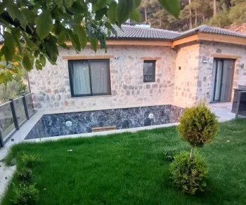 Uzumlu stone-built authentic villa in Nif for sale